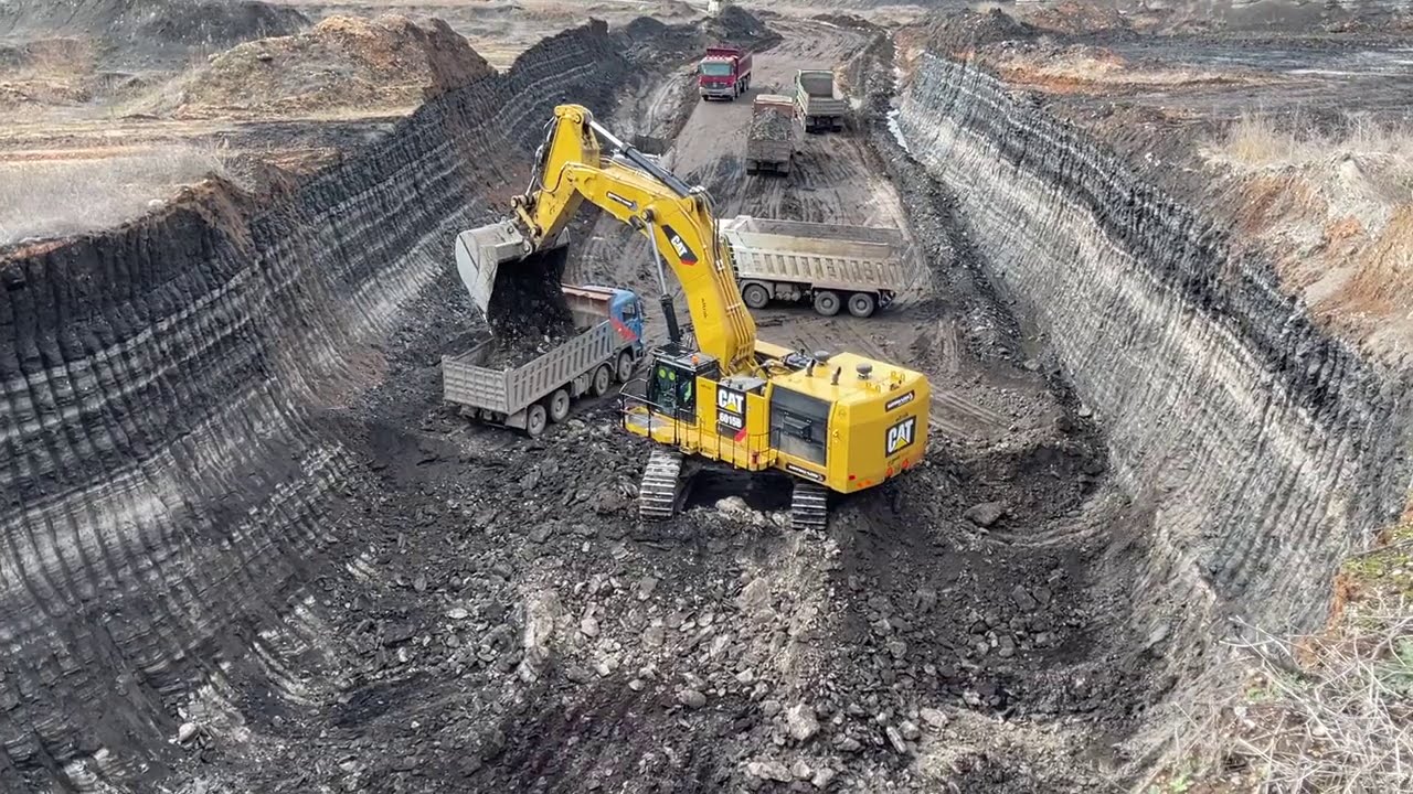 Caterpillar 6015B Excavator Loading Trucks With Two Passes - Sotiriadis Mining Works