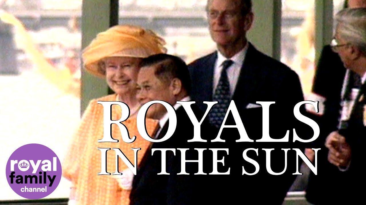 Royals in the Sun: The Queen watches royal barge procession in Bangkok!