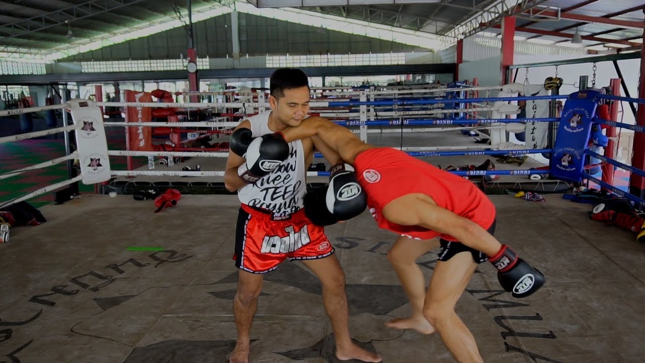 Muay Thai Clinching - How to Counter the Stiff Arm Control