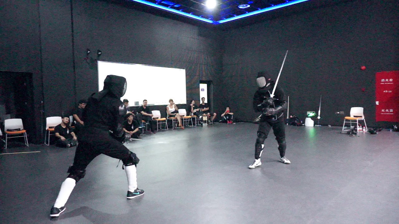 MJ Ma and Axel Pettersson sparring on Shanghai Longsword Seminar