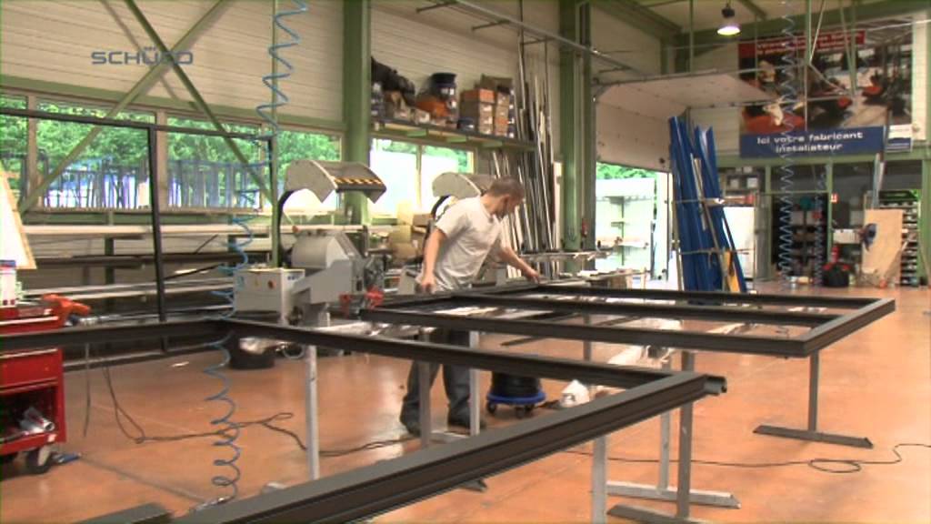 Construction d'une véranda système Schüco