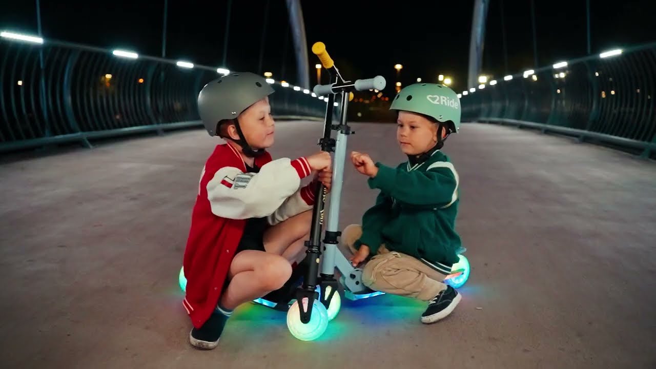 LUMI RIDE Hulajnoga LED 7 kolor&oacute;w 🚀 Składana, regulowana, dla dzieci | Sun Baby