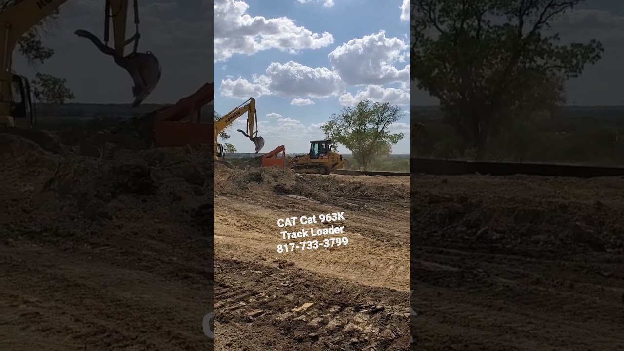 Cat 963K Track Loader doing dirt work 
