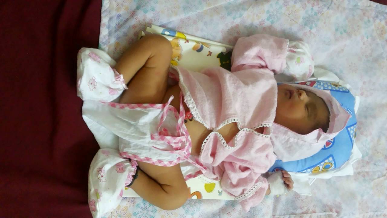 Baby girl enjoying sleep.....