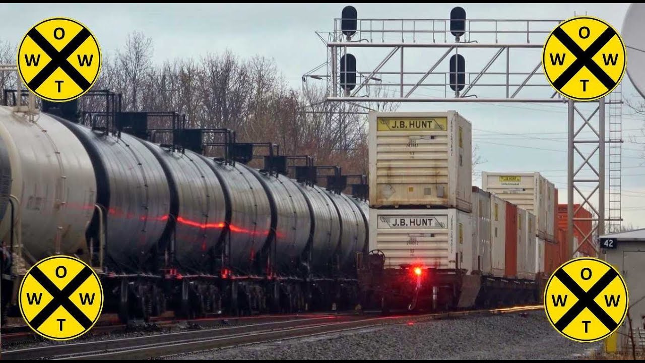CSX Mid Train DPU Meets Long  BNSF Oil Tanker Train