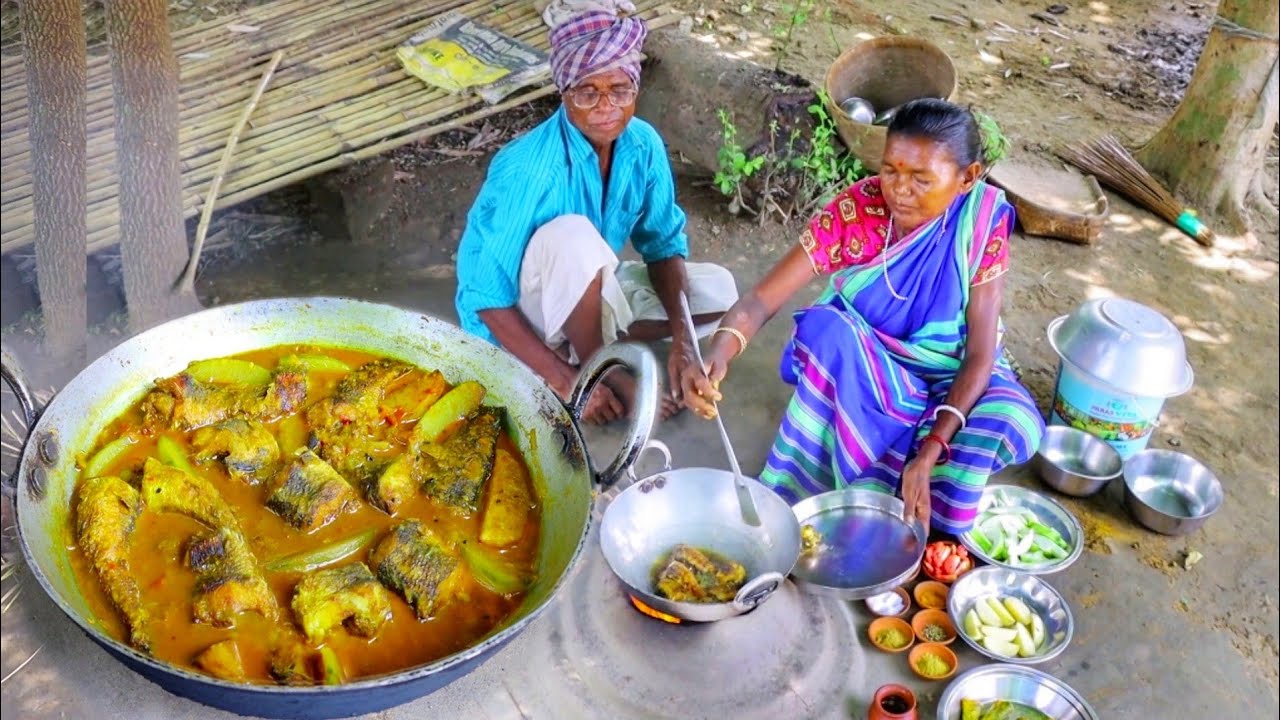 santali tribe grandma cooking FISH CURRY recipe with vegetables after fishing from field|fish curry