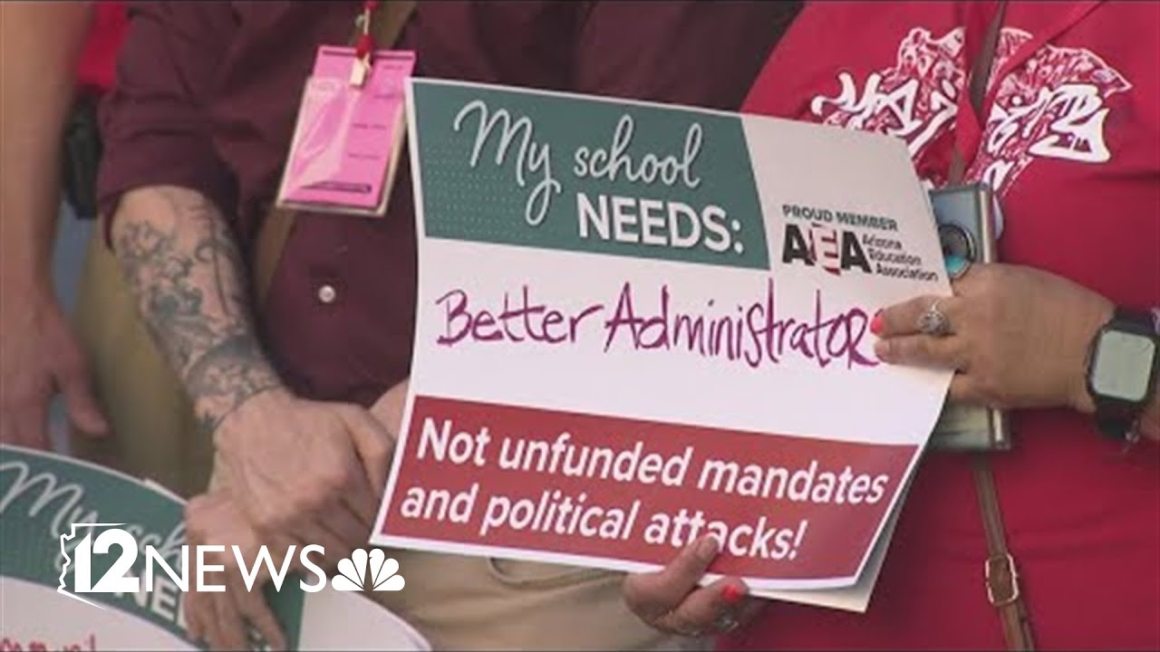 Teachers and union leaders protest potential ballot measure restricting funds for unions