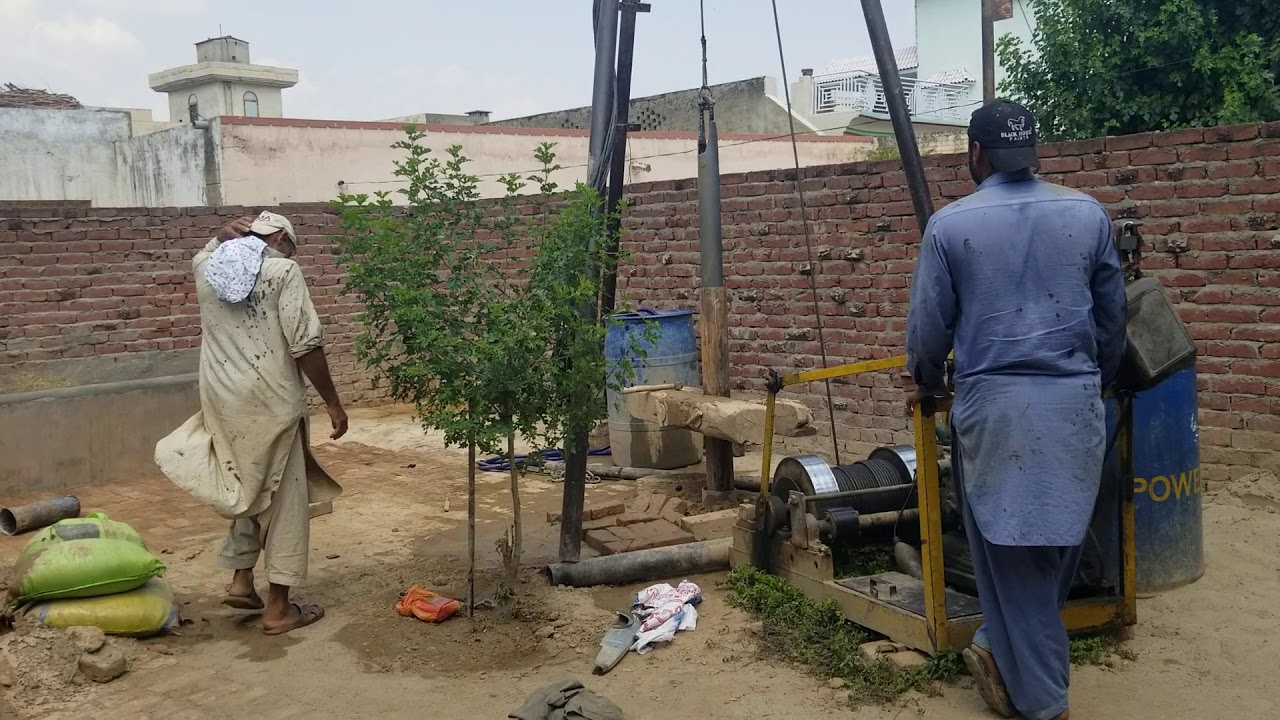 Hand borewell drilling inside a house