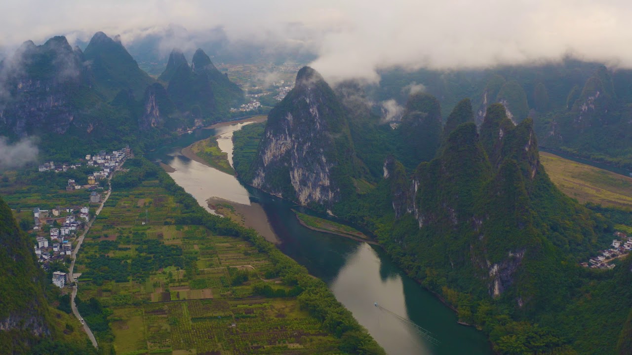 Guilin Karst Mountains and Li River from Xianggong Hill (4K Aerial)