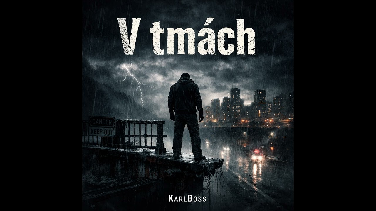 V tmách