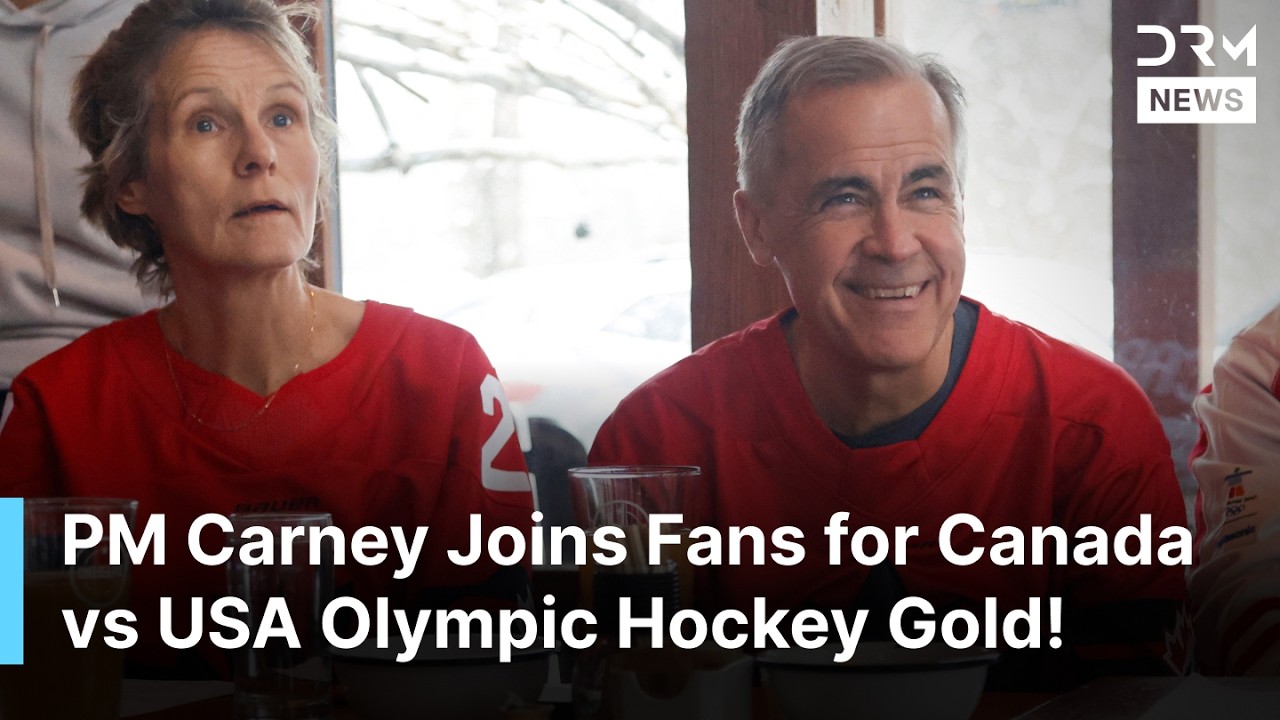 WATCH: Canadian PM Mark Carney Watches Canada Take on USA in Olympic Hockey Gold Match | AC1Z