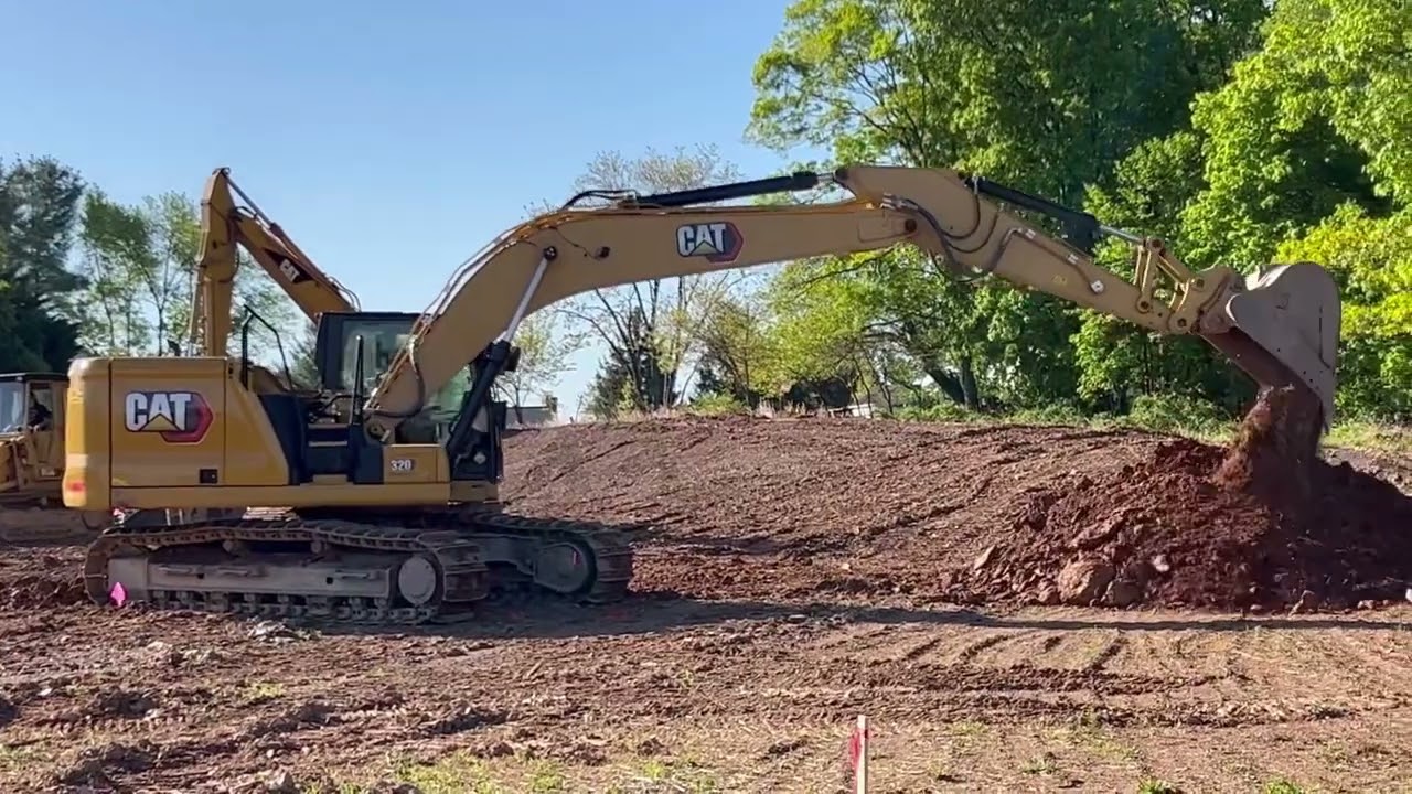 New CAT 320 Excavator Digging Out Basement