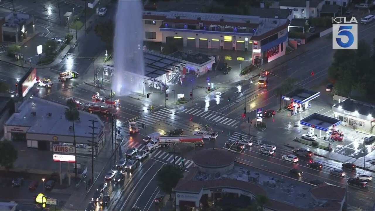 Hydrant geyser collapses Tarzana gas station awning