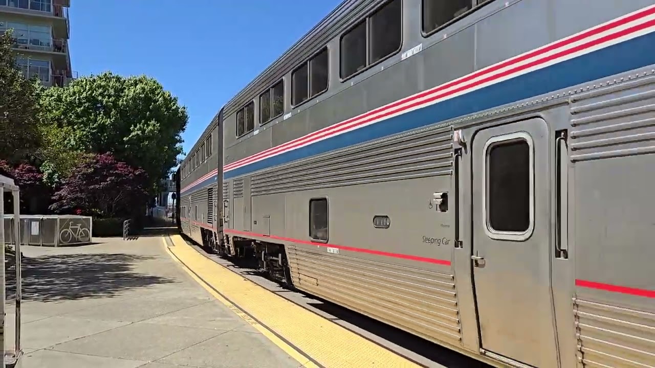 Late 1hr 59mins Amtrak Coast Starlight #11 leads by AMTK #314 ALC-42 at Emeryville Station
