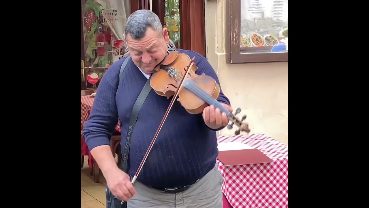 Amazing street fiddler in Rome working a restaurant to earn money #travel #rome #fiddle #streetmusic