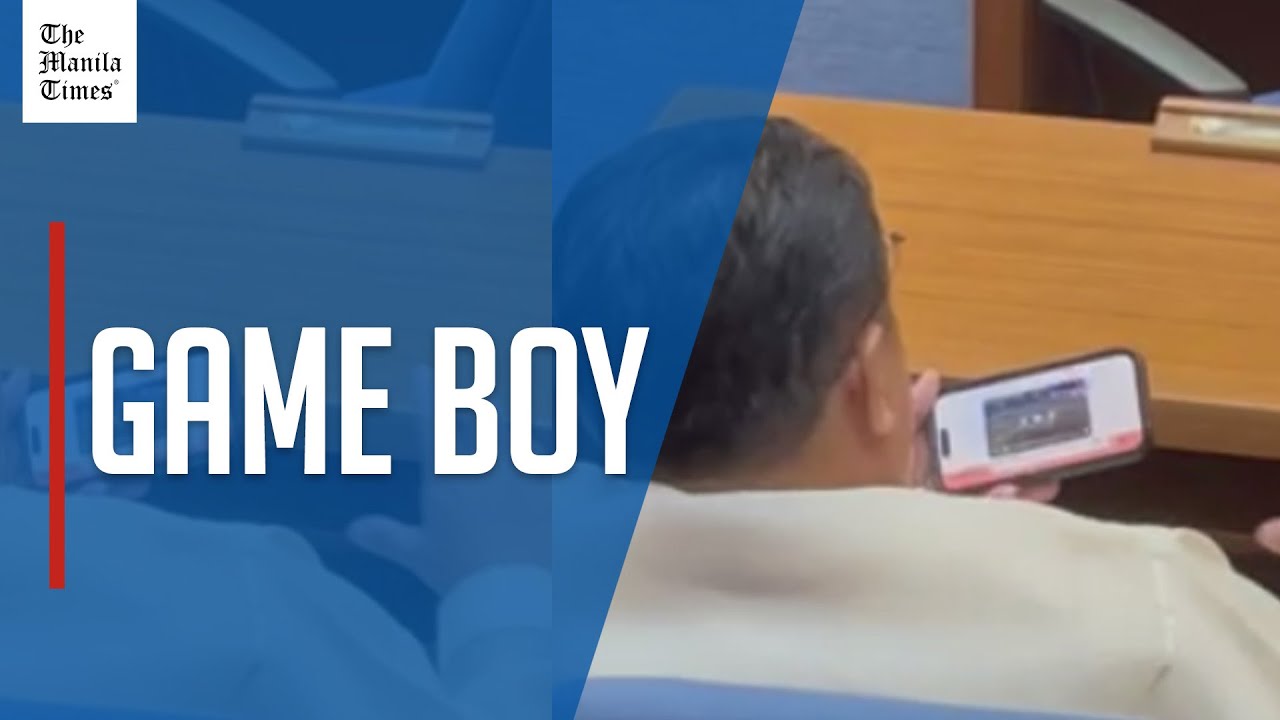 Lawmaker pulls out mobile phone to check out video of another fight outside House
