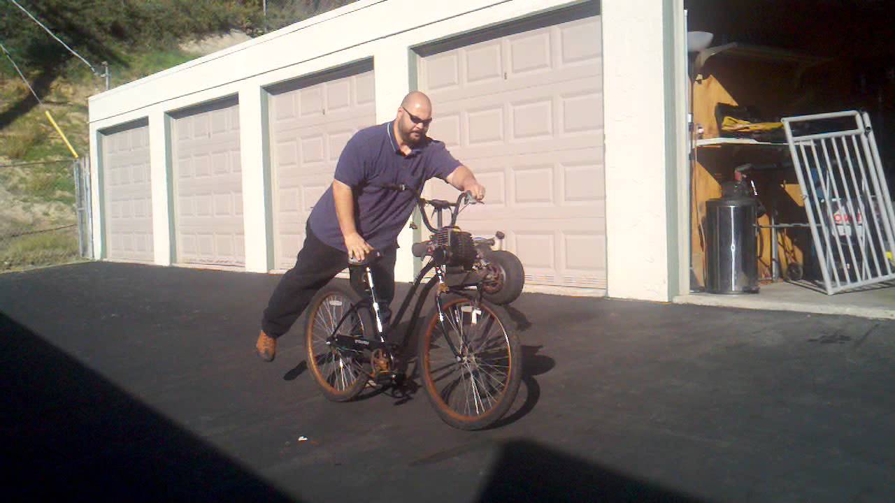 Motorized front engine friction drive bike