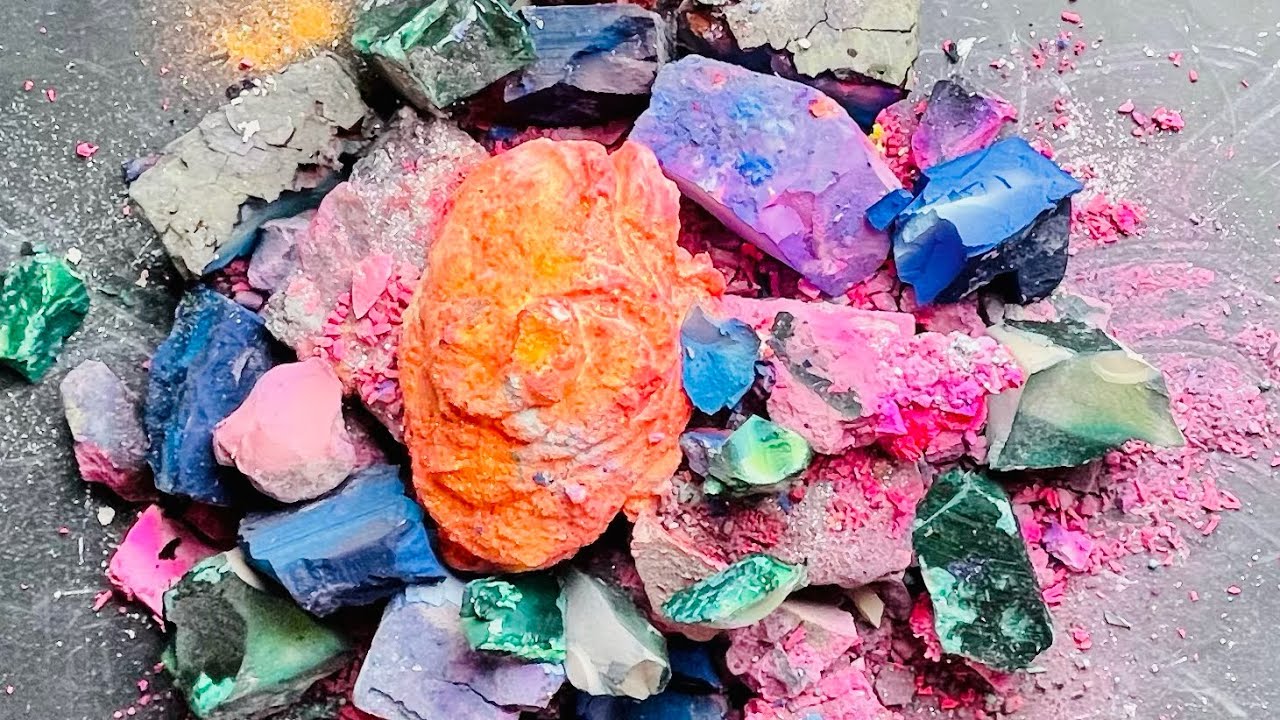 Dyed pieces of fresh gym chalk and glob of paste