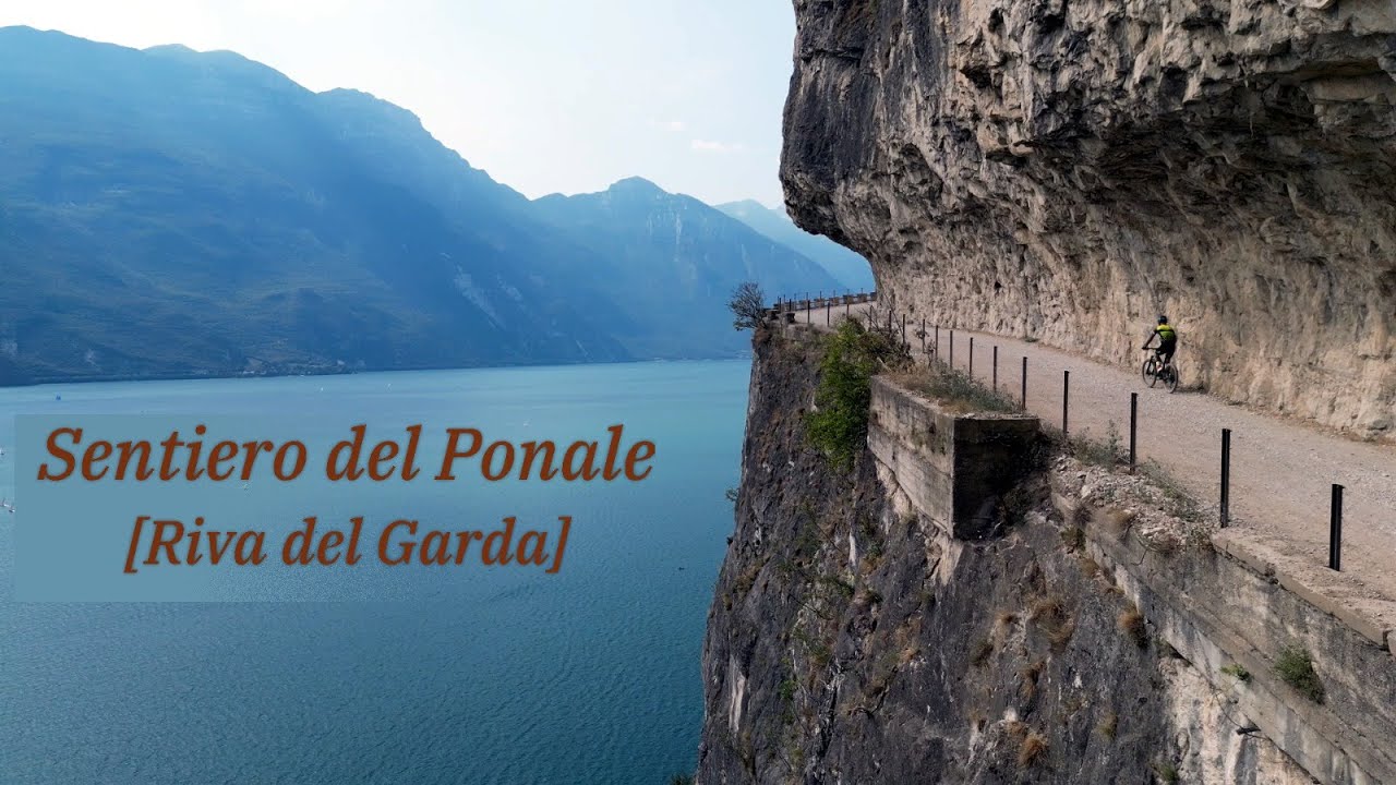Following a bike inside a cave of the Ponale Path between Riva del Garda and Pregasina