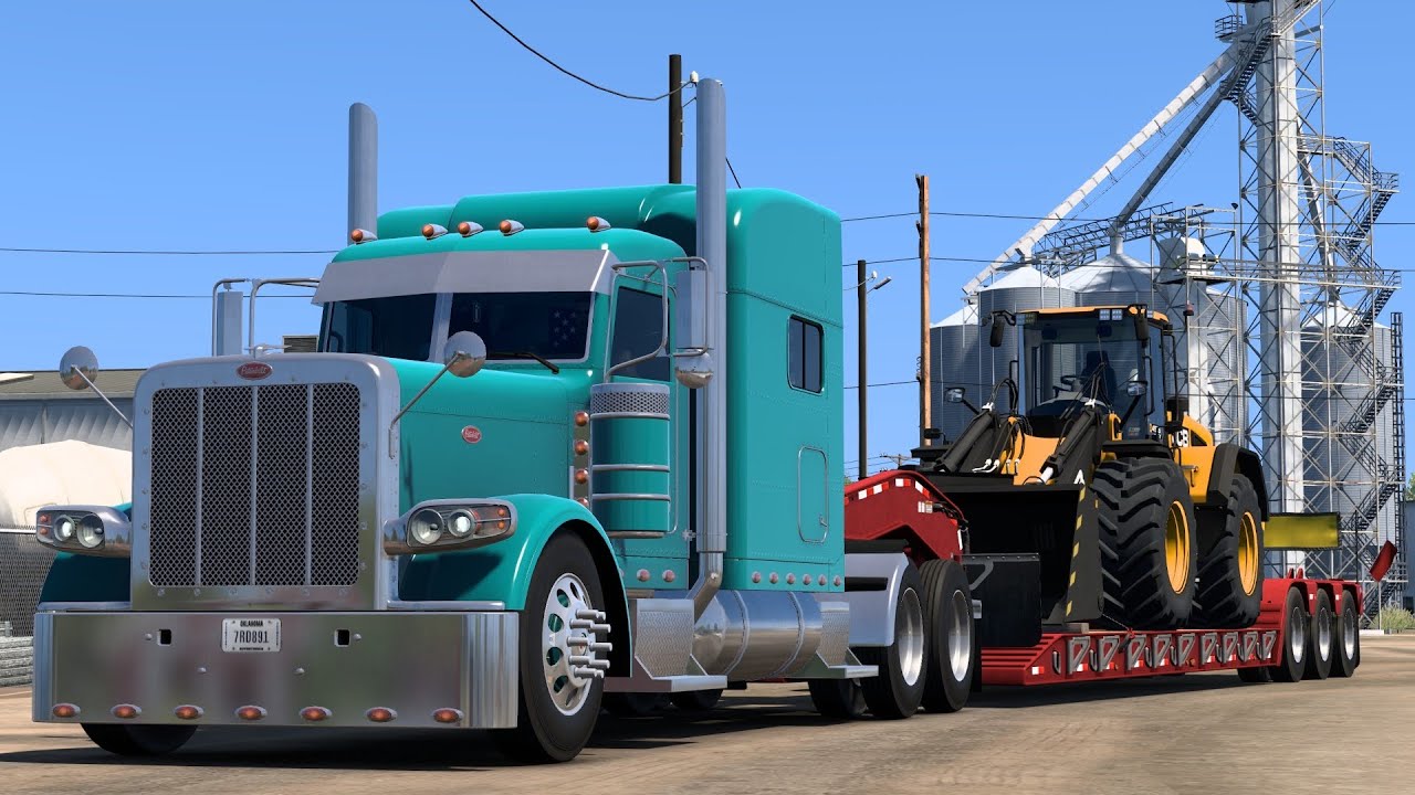 Peterbilt 389 (CAT 3406B) Hauling Wheel Loader JCB 457 in Nebraska (Omaha - McCook)