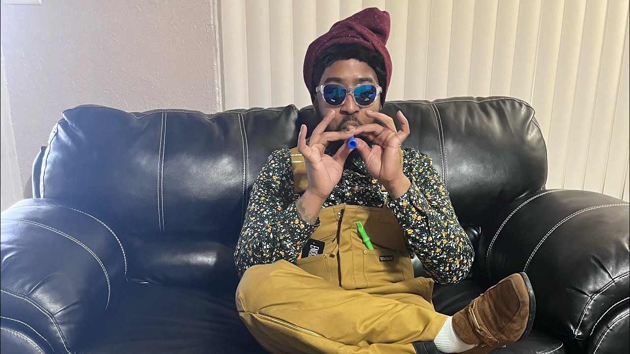 Andre 3000 playing the flute instead of rapping