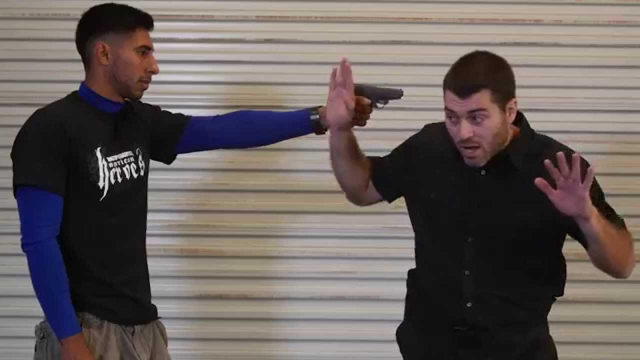 Self Defense Tactics: Gun To Head Disarm