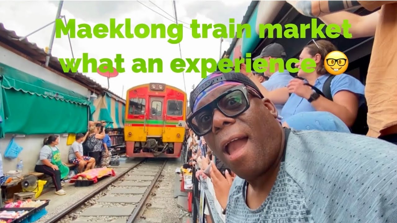 Bangkok - The incredible train approach at Maeklong train market.