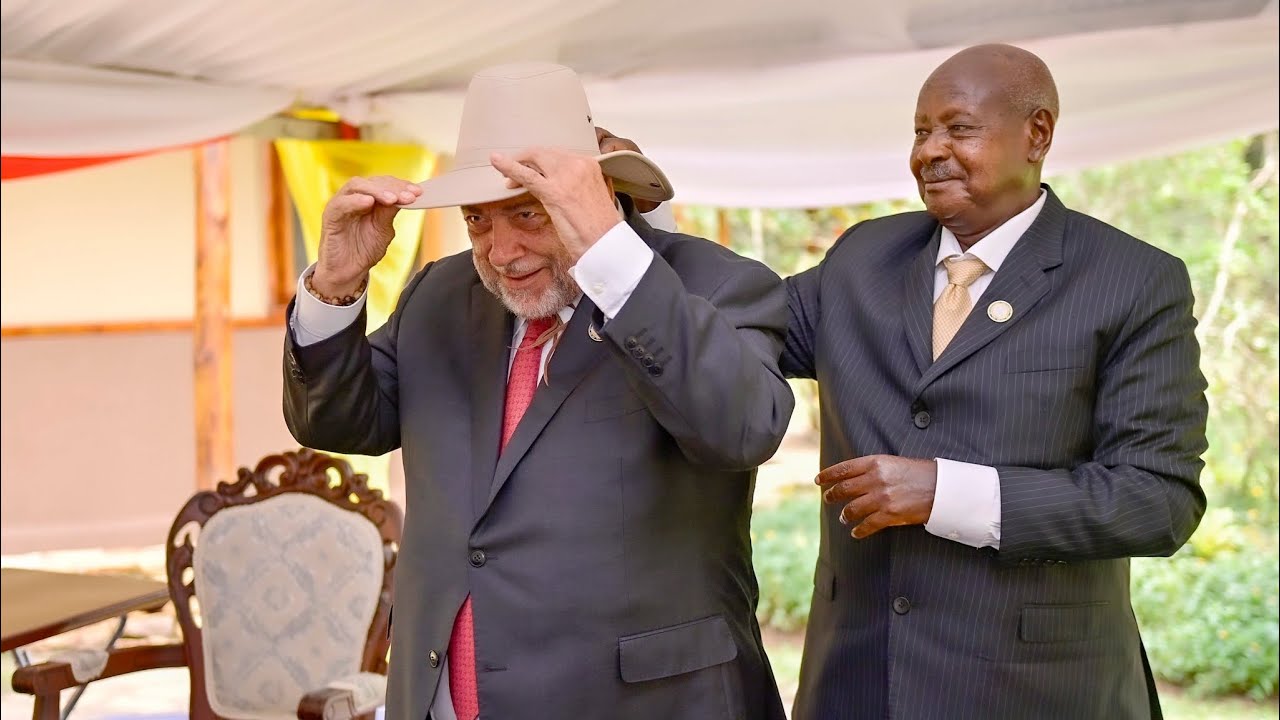 Museveni’s Gifts PM Ralph Gonsalves of St. Vincent and Grenadines his Hat 🎩.
