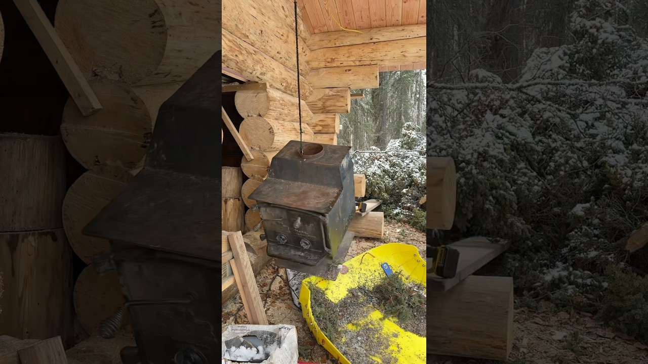 Getting the stove in the log cabin. #sfyk #logcabin #offgrid #alaska