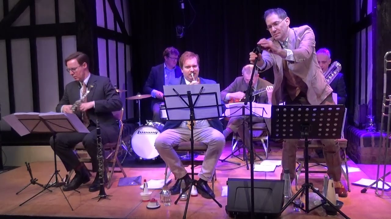 Chris Lowe (trombone) takes the vocals for the Harry Wood/Mort Dixon composed “Lucky Little Devil”