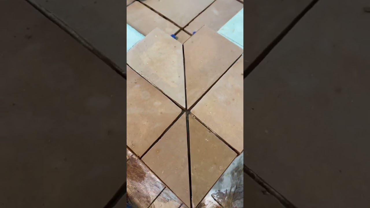 Zellige Tiles.  Tiling a shower floor and mitered curb