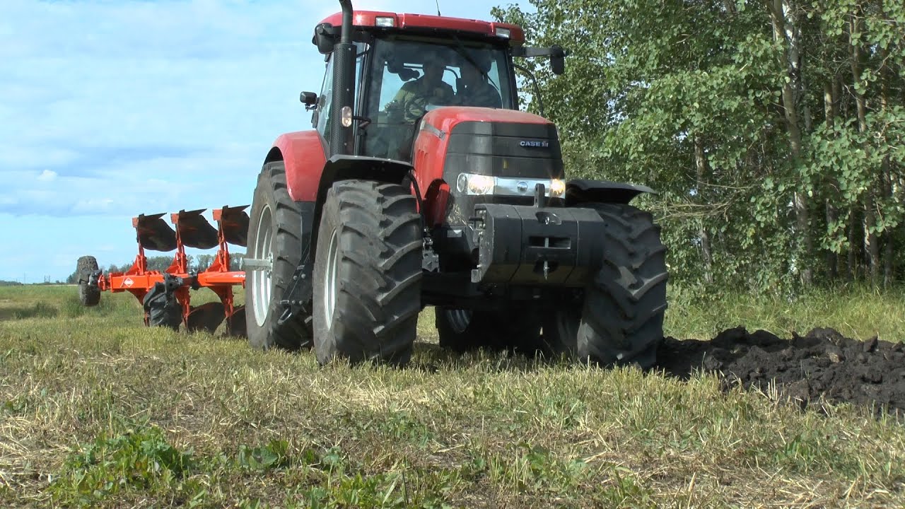 Case IH Puma 210 and plow KUHN Multi-Master 153 6T