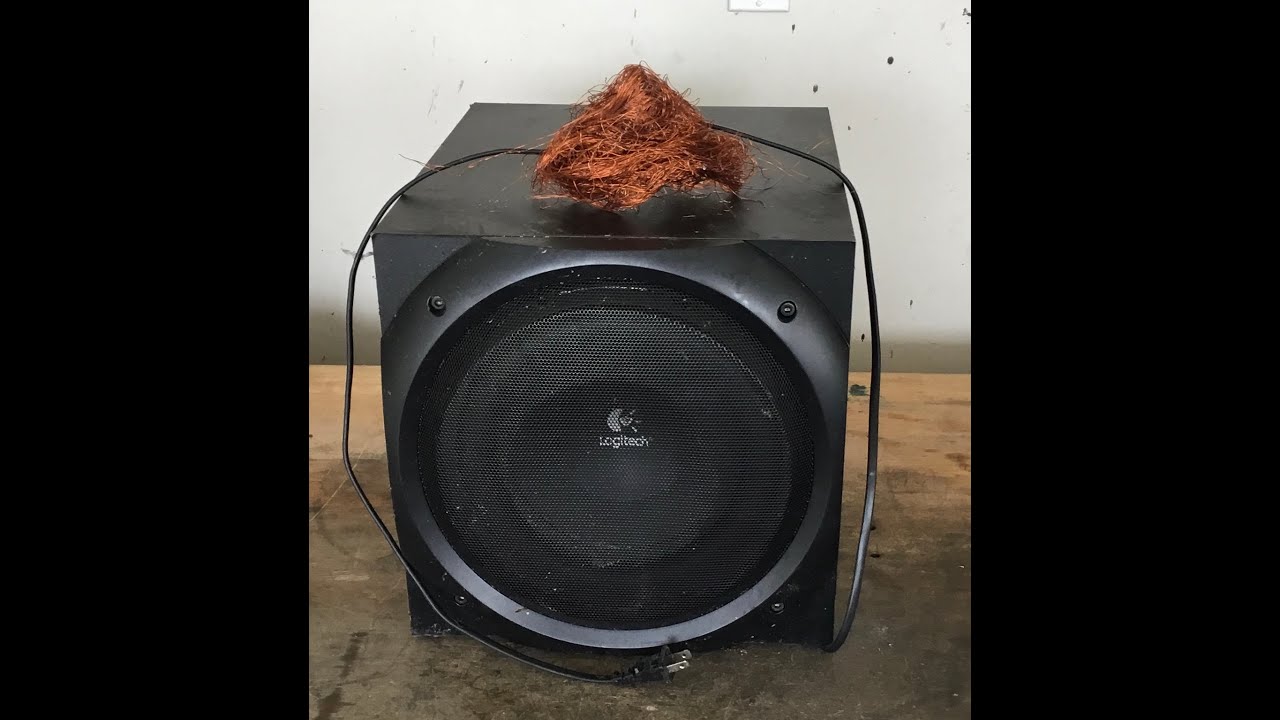 Scrapping a subwoofer for loads of copper, aluminum, and steel.