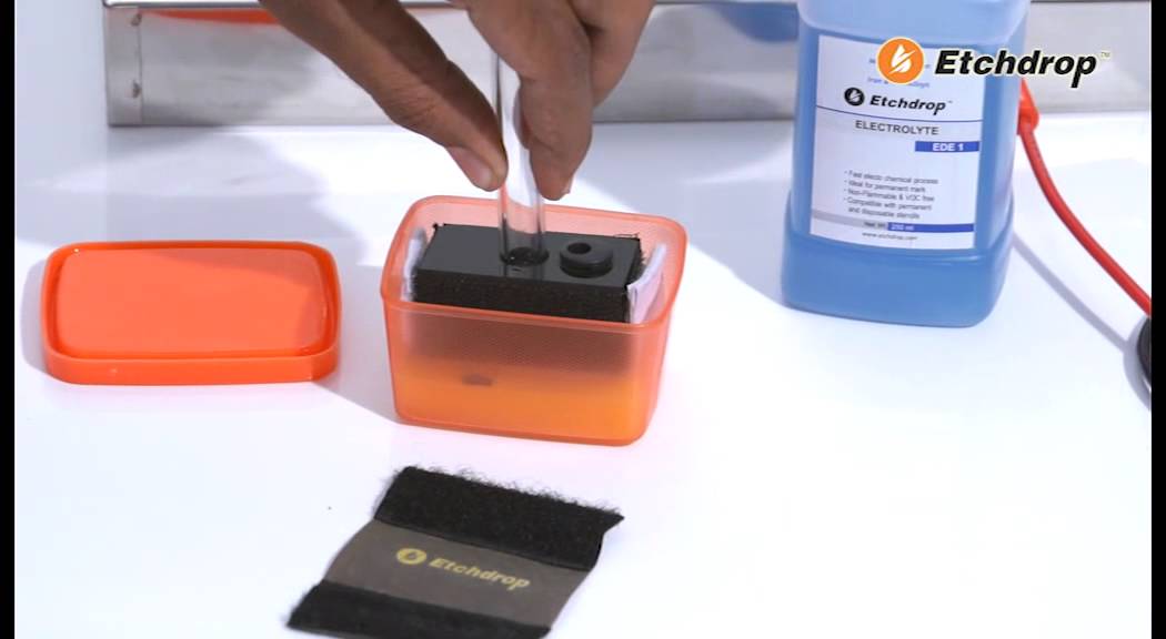 Etchdrop metal marking system