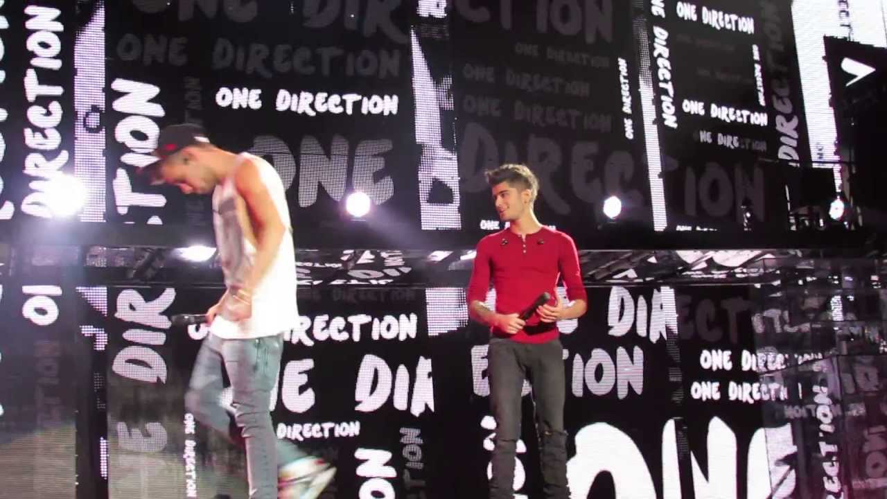 One Direction singing  