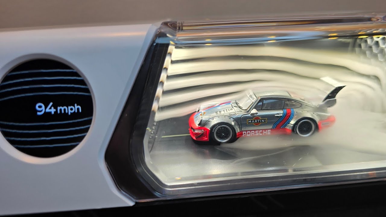 Wind tunnel for Diecast Cars.What is the effect of the aerodynamics on a car with a big rear wing??