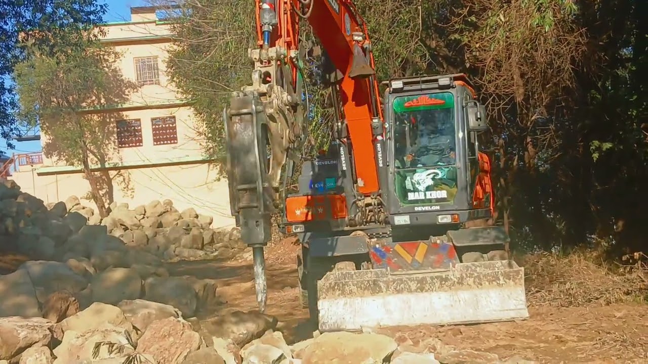 Dx140 Excavator  Turning big Stones into Small Pices for Souling on Road #solin #xcavator #excavator