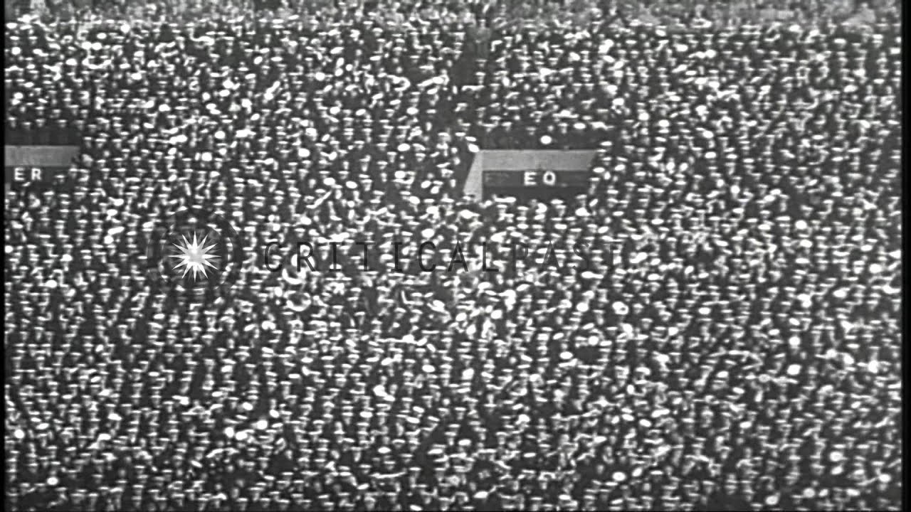 A large crowd gathers to watch a football match between the US Army and the US Na...HD Stock Footage