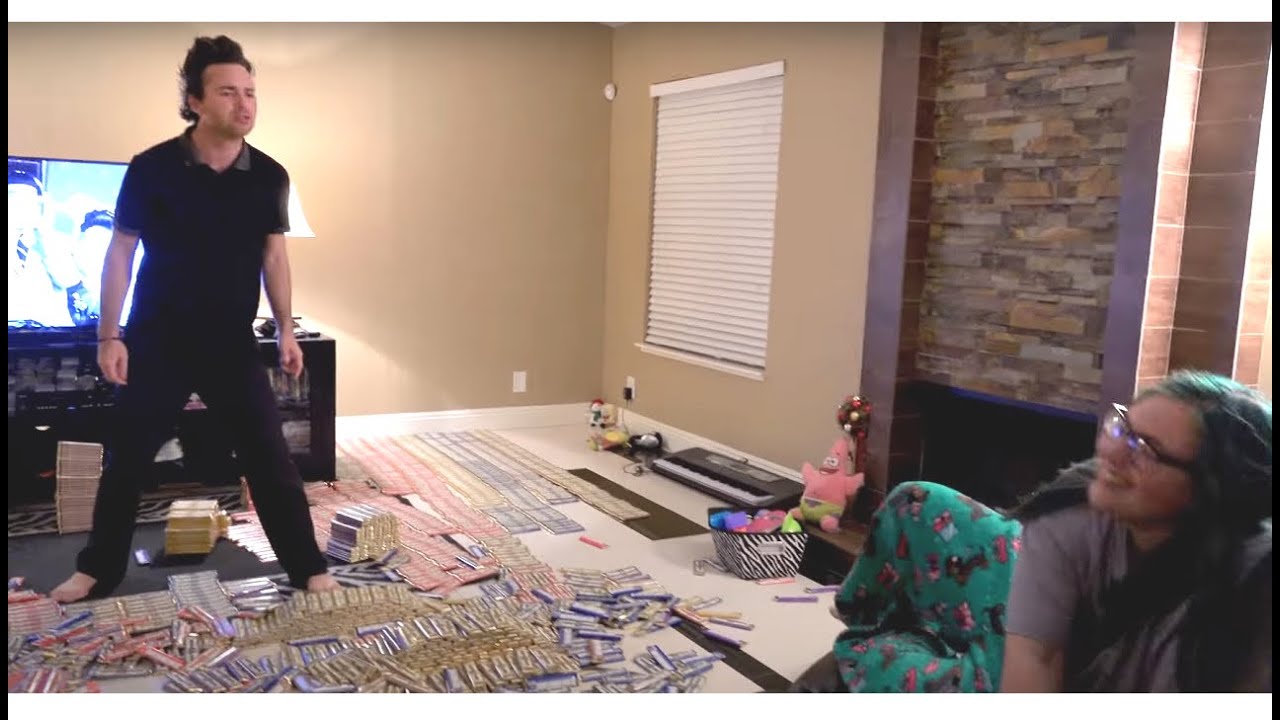 CRAZY BOYFRIEND REACTS TO 5,000 CHOCOLATE BARS!