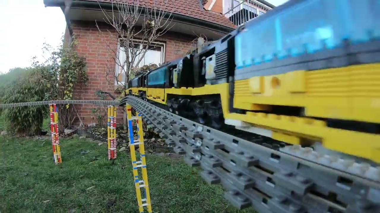 Lego 9v Züge 4558 4559 4560 4511 draußen auf Traupolin und großer Brücke