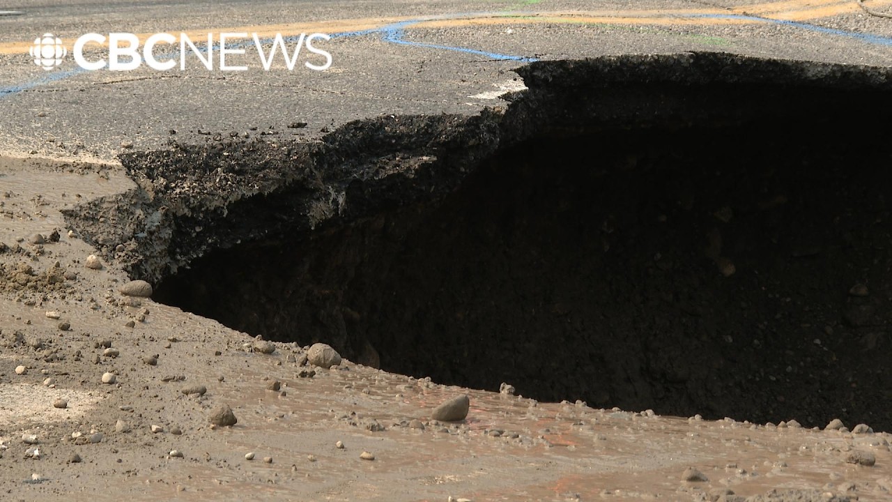 Sinkhole swallows road in Bowness after water main break