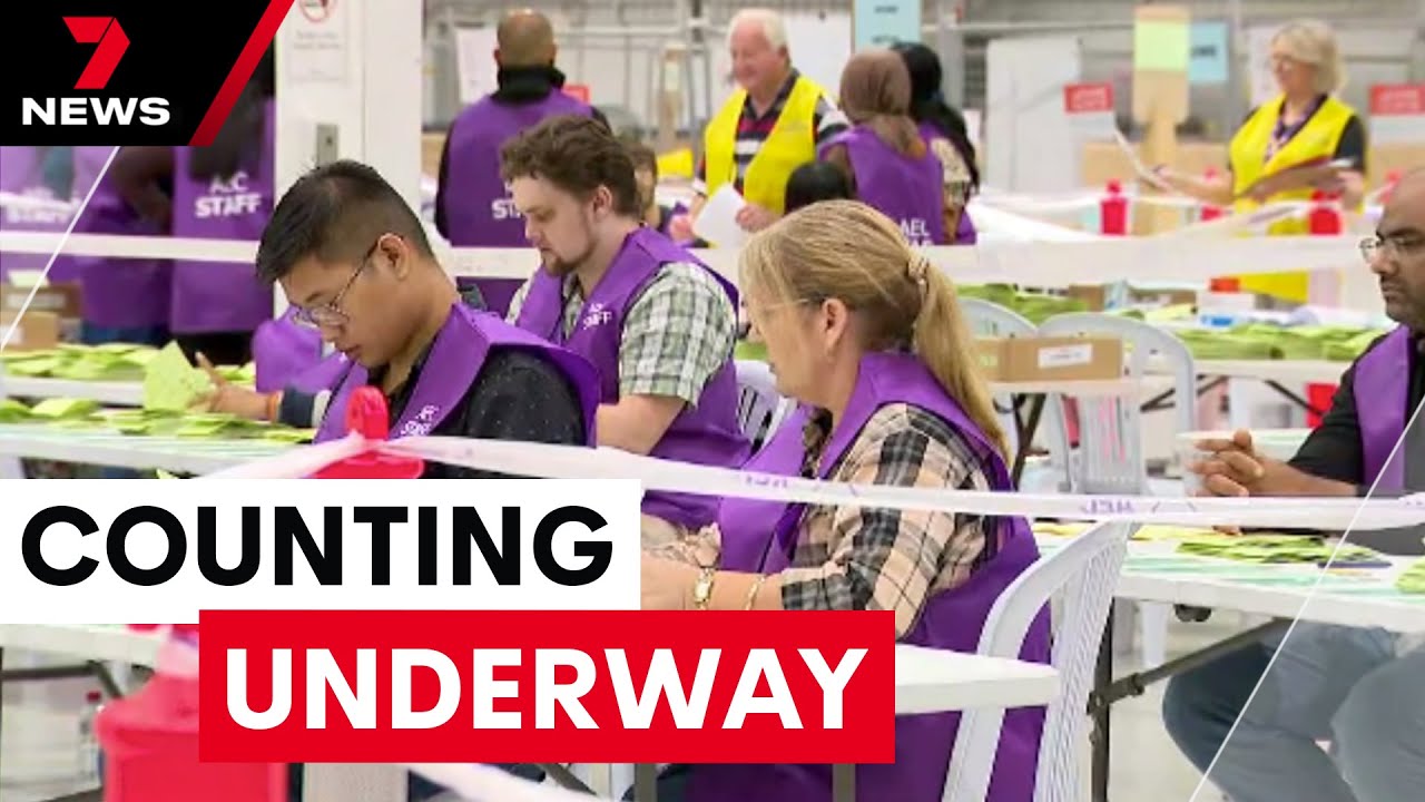 AEC volunteers get to work counting the votes | 7NEWS