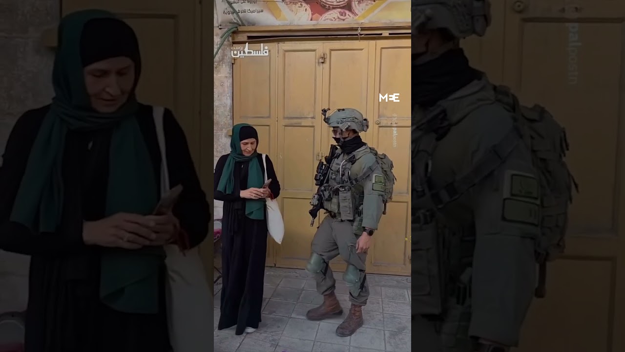 Israeli soldiers obstruct journalists' and activists' coverage of settles' raid in Hebron