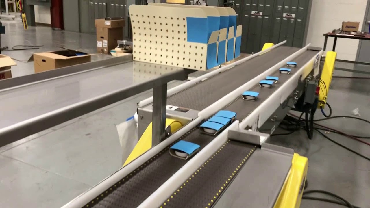 Reflow Accumulation Feeds Two Hand Pack Stations