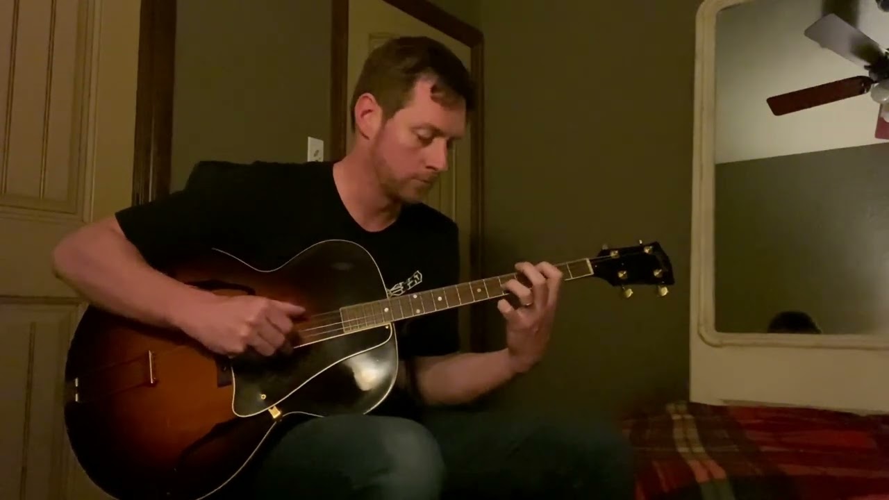 Blackbird on tenor guitar by Tyler Jackson