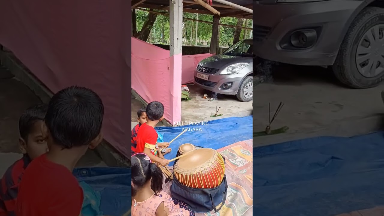 CHILD PLAYING NAGARA IN ASSAM