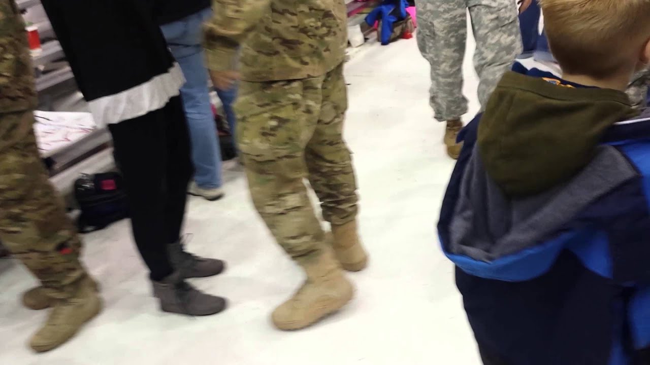 Kids seeing dad for the first time after deploymen