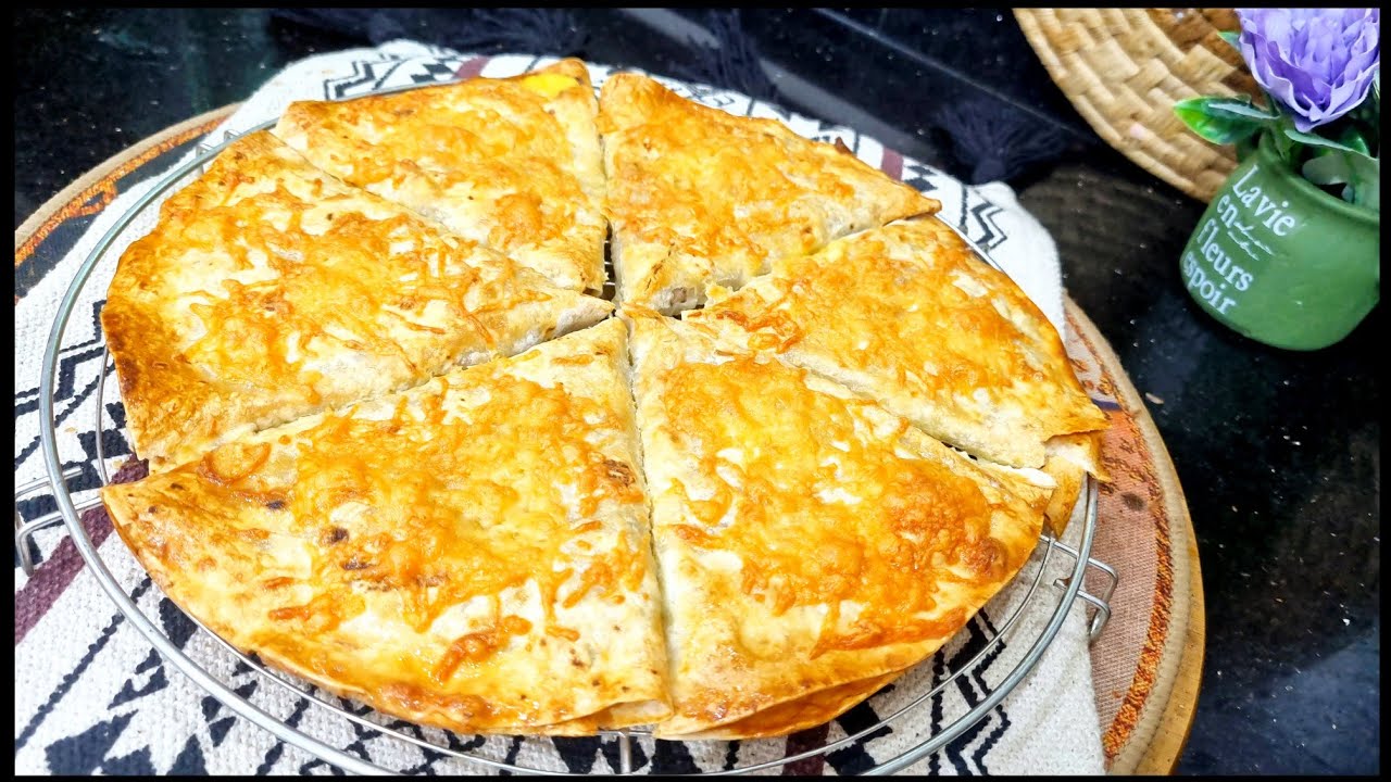 مطبخ ام وليد / اسهل و اسرع مملحة ممكن توجديها بحشو خفيف و بنين ، مثلثات بدون عجين 😋👍😍.