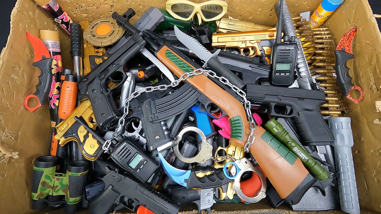 Airsoft Guns, Beretta M92, Glock 18, Box of Toy Guns, Kalashnikov AK-47 And Karambit Knives