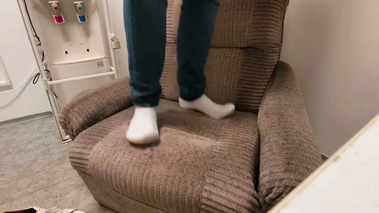 Friend jumping on a chair